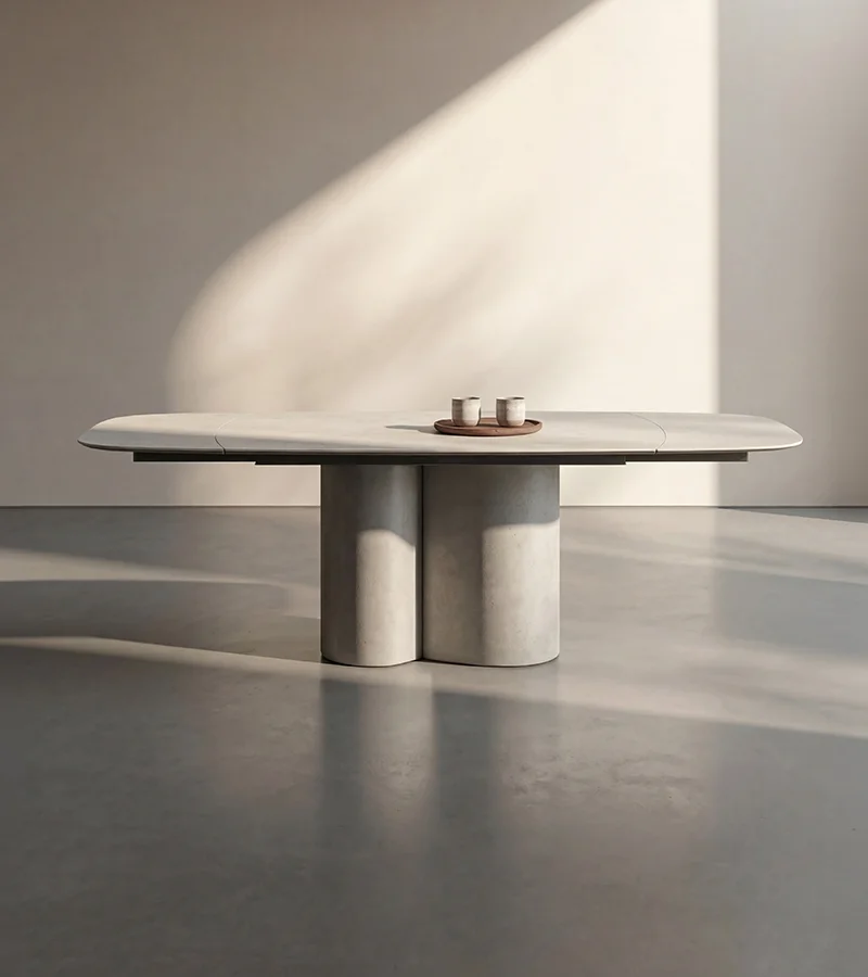 Tavolo ovale con base in cemento