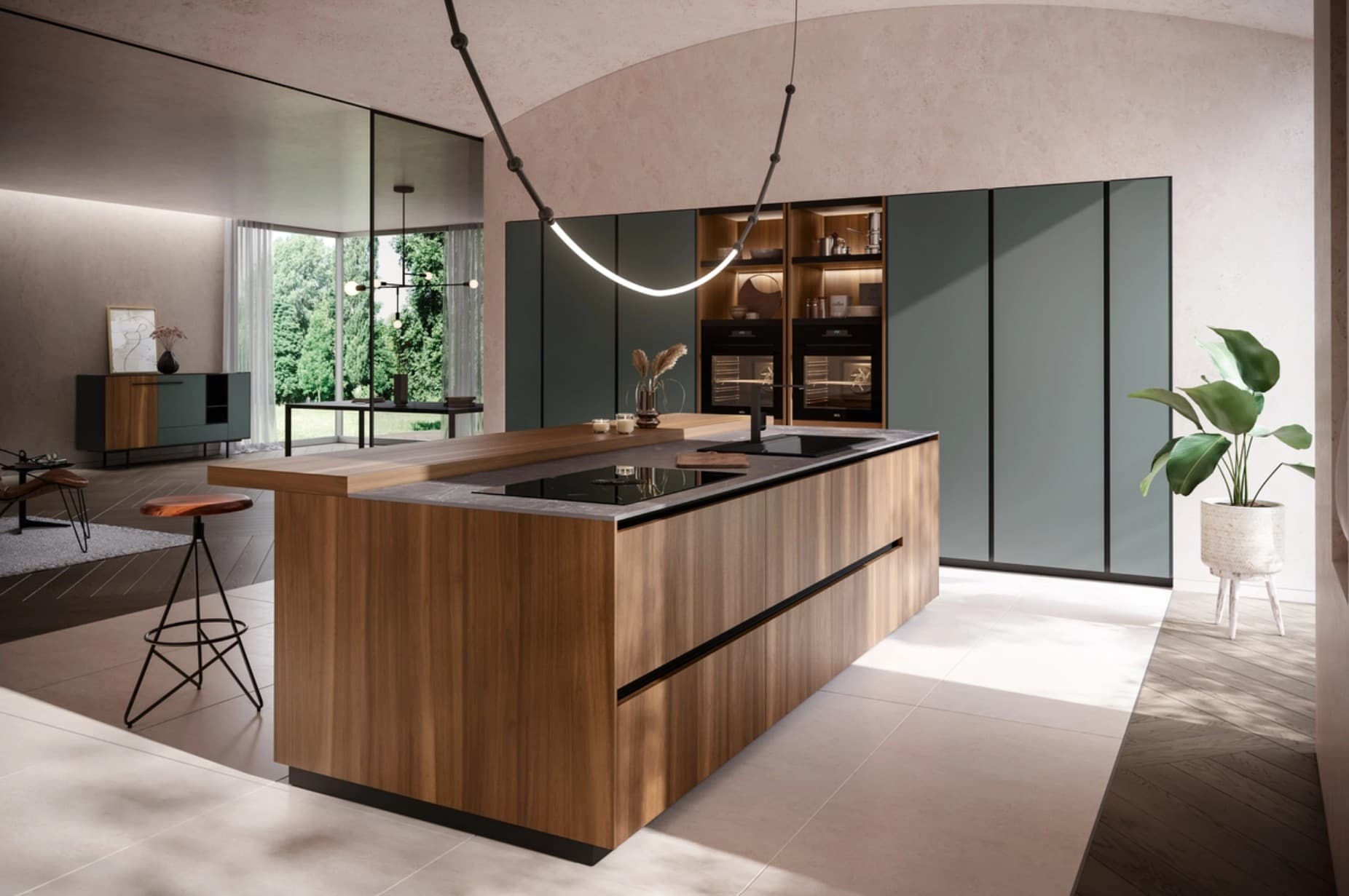 Cucina con isola in legno e colonne verde petrolio